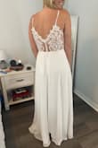 Got this for my vow renewal ceremony on a beach. The front of this one is a bit plain, but the back is sooo pretty. It is so comfortable and flattering. I got a large, and I would not need any alternations. - Sherri M.