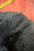This dress arrived with several holes and pieces of fabric. Very bad. - YANETH A.