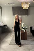 This jumpsuit was so beautiful and I got several compliments throughout the night!! It was a little large on the back straps and the length. I had to get it taken in a bit but once I did, it fit me beautifully! - Andi L.