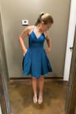 I love the color and the fit. The straps are adjustable. It is a little shorter than I would like for my daughter but she has shorts to wear underneath. - Lacy S.