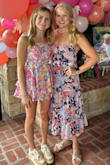 Loved this two-piece. When I ordered it, I hoped that my short torso (yes even though I am tall) would help make it so that I wasn't showing any midriff, since I am 44 and have had 3 kids, and it was perfection! Loved everything about it, and I got lots of compliments at my daughter's sweet 16 party. - Megan P.