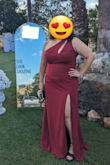 Got this for a formal wedding that was going to be on a hot day. The material was thicker than I expected so it was a little warm while the sun was out, but came in handy once it got dark. I loved the cutout detail in the one shoulder strap. It was just revealing enough without being gratuitous. I'm also pretty short so the slit hit at the perfect place on my thigh. It is a little on the longer side but was perfect with my 4" heels that I'd picked to wear with it. I would definitely recommend it! - Elyse P.