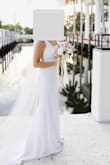 I bought this dress and absolutely loved it. It was a little too long but it worked out just fine with high heels. - Emma R.
