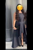 I wore this dress to a wedding and it is beautiful. You will definitely need to steam this dress out of the packaging and the material does wrinkle easily. I ordered a L and found it was a little tight on the top but sizing up would've been too large. I am 5'2" and it needed a hem. The straps tighten towards your chest not away, so you can't pull the neckline up which can lead to some side-boob. The fit wasn't my favorite but overall I plan to wear it again and it's a great dress to have in my closet. - Madison B.