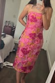 I love this dress. Fell in love with it when I saw it and even more when tried it on. Quality is amazing! It was big on me, but unfortunately, it was the last one when I bought it. Otherwise, I would've exchanged it for an xs. I will be keeping it though, planning on having it tailored to fit my body. - Rocio A.