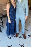 It was a little loose but not so much that anyone would notice but me and definitely wouldn't have fit into a small size. Very flattering if covering the stomach area yet still fun with the deep v. - Ashlee C.