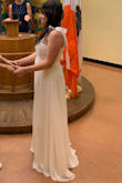 I wore this dress to my civil ceremony and felt very comfortable and pretty in it. I should have gotten it hemmed because I'm 5'2", and it was too long, even in my tallest heels. I have a 32G bust and was pleasantly surprised that the dress fit over them. The quality is very nice, and I highly recommend this dress :) - Eve F.