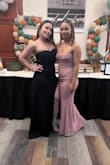 I bought 2 dresses. One, I forgot to return, but this dress is absolutely stunning! I wore it for Air Force Ball, and I got so many compliments. My husband loves it so much. - Anna T.