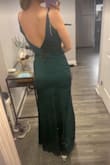 It's pretty but a little too plain for me. It hugs your curves though and the back is killer. - Violet C.