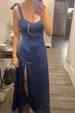 Such a nice flowy satin dress. The blue is quite light in person. The fit was perfect but the bow straps weren't my favourite. - Violet C.