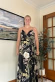 This is a gorgeous, lined, quality material dress! True to size, I got a large and I'm normally a 10/12.. perfect for a fall wedding in this black color, with a pop of pretty flowers! (Ignore my blue scrunchie!) - Elizabeth P.