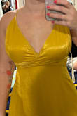 The fabric around the chest didn't lay well. The fabric underneath the silky part kept rolling out and the fabric didn't lay well. - Jessica H.