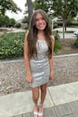 My daughter loved this dress. Fit well with a strapless bra. It could have been taken in on the sides and hemmed, but we didn't have time to get it altered. Still looked perfect! - Jamie C.