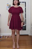 Overall cute dress and fits true to size. I got a Large and usually wear 10-12. It's very light and allows for movement. The only thing is that the bottom skirt is not attached at the back, so it sits lower than I would like and moves around. - Aidana A.