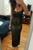 The dress was gorgeous. I just was uncomfortable with the amount of nude color in it. I felt like I looked naked with lace over. - Suzanne M.