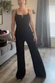 I ordered this on a whim thinking it would be terrible, and I ended up loving it. It is made of a thicker, stretchy material. It is also lined. - Ashley M.