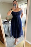 I love this dress! It's very flattering and overall super adorable. I don't have a super huge chest, but I'll probably have to use some garment tape just to ensure the dress stays put in the bust area. - Kylie F.