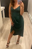 I loved this dress! it was the tiniest bit tight/fitted in the bust area (flattered me in a good way!), but it fit me perfectly (no bra) - I wouldn't have changed the size (medium would have been too big all around)! The color was perfect for a late summer wedding. I got so many compliments on it! will def wear it again! - Kaileigh S.