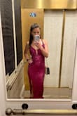 Bought this dress for a trip to Vegas. I ordered probably 10 dresses and was getting frustrated trying to find one that flattered my athletic body. I also have a very small bust after having two babies. The fact that this laces up and you can adjust it to your body was just what I needed! The slit was a good length, just enough. It's got a lot of stretch to it and traveled well. The support bar in the bust was also an added bonus. A really quality dress at a great price! - Mary B.