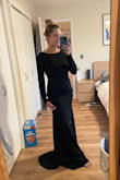 Fits like a glove, it's stretchy and so beautiful! Such a gorgeous gown! - Jessica R.