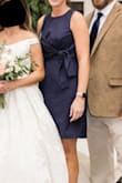 The fit is very flattering and the length was perfect for my event. - Charla C.