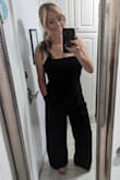 Fits perfectly. Nice flowy linen material. Straps can be adjusted. Getting lots of compliments! Tank top underneath. - Amber H.