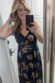 I am normally a medium sometimes large and went with large because of my boobs and reviews. The button broke before I made it to the wedding! I don't like being very exposed. Had to safety pin in together. It is a lot of material! Very good quality. So my leg didn't show like in the photo because it was wrapped so much. If I got an XL it would have been way too much material. - Amber H.