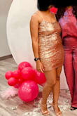 The dress is pretty flexible in terms of its shape and size. Love the sequins and pretty comfortable to wear! - Danae O.
