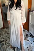 The material is good, not see-through. Love that it shows a little leg when moving. Felt pretty and comfortable in it. Would probably add a cute belt to dress it up. - Elsa G.
