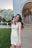 The quality of this dress is so nice. The straps do not fall off. It's not stretchy but it fits perfectly. It wasn't too short compared to other dresses. I got it for homecoming and I am so glad!!! - Addison W.