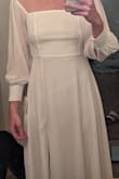 I was really excited for this dress, as I was planning to wear it for engagement photos, but the front seamlines are awful along the bust. There are two pieces of material up top. As you can see in the photo, they are not sewn together so the hemming/seams move around, and you can very obviously see the different seams. I considered taking it to my seamstress to have them sewn together or doing it myself, but that's more time and money that I'd rather not waste. The model photos must have some flash or editing done, as they don't accurately reflect the color and lining. Now looking back at one of the review photos, you can see the moving seamlines, which I should have noticed before buying. Super sad! - Sydney B.