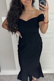 I absolutely LOVED this dress! I wore it to a work gala and received so many compliments. This dress definitely flatters you in the best way possible!! - Arianna A.