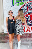 I wore this dress for a game day, and I had no problem with it! Even though the straps are tie straps, they don't come undone. I got so many compliments, and I will definitely be wearing this dress again! - Malia B.