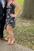 I love this dress, and I really think it looks better in person. However, it is REALLY short on the one side. And I'm only 5'2". The longer side was fine, but the short side was too short to sit down in, and I needed a shawl to cover up my lap. - Emily S.