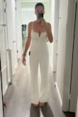 I'm 5'8 and 110 lbs with natural DD boobs, and this fits perfectly even without a bra! I bought the XS and planning on wearing it for NYE this year with some sparkly shoes/accessories! - Lindsey E.