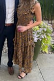 I got a size small, and it was perfect! I tried it on with either nude heels or black heels and both looked perfect. It's a comfortable material too. - McKenna L.
