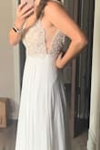 Got this as a backup dress since I wasn't sure my other dress would be done with alterations in time. I wish I'd found it first cause I like it more, and it was way cheaper (the other dress was $1000 before alterations)! My other dress ended up turning out fine so I ultimately returned, but I would have been equally happy with this one! Looks better in person - Kelly S.