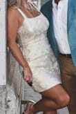 This dress is so flattering, I got so many complements on it. I felt amazing for my rehearsal dinner. We also had to go up a few flight of stairs and I felt confident in this as it was the perfect length and fit to keep me covered. I wasn't pulling at it to keep it down. I love that this can be dressed up or down as a bridal look or even a beach getaway. - Amber B.