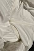 The dress arrived with stains to the bust/armpits, and smelt of body odor. The smell was so strong and immediately noticed upon opening the package. Very disappointing. - Lyndsey H.