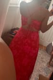 This dress is gorgeous. Love the side slip, the deep V, and the crisscross open back. The color is beautiful. - Dennise