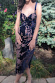 I wore this dress for a wedding and loved it. One of the loops in the back did rip before I wore it, so I did have to sew it unfortunately, but other than that it was perfect. The fabric is delicate so be careful when tying up the back. - Hayley W.