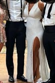 This dress was so beautiful and comfortable. I changed from my wedding dress to this after dinner just in time for dancing. It was so easy to move in and I had so many compliments! Loved the slit it was perfect for the garter toss - Brittany E.