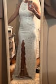 I got this dress in case I didn't like the altering of my wedding dress. It is beautiful and so comfortable. I'm going to wear it on our honey to dinner or something. This would be a perfect wedding dress for the beach. - Brittany E.