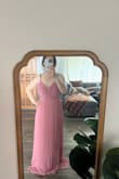 This is a beautiful dress that fits perfectly but was way too long. The material was good quality. I am 5'2 and had to get it tailored. - Mayra S.