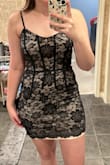Super cute dress. It looks just like the photo and is good quality. My only complaint is that the lace at the bottom of the dress is not sewn to the nude dressing underneath, so when the lacy scrunches up you can see the nude dress a little bit. Still worth wearing! - Emma L.