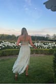 This two-piece is adorable. It fit perfectly and was super flattering. I've worn it out a few times (one of which was my bachelorette) and love it. You can mix and match the top/bottom with other pieces as well. - Lauren W.