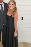 It fits very well. I just had to get it shortened a bit, but otherwise, you are able to adjust the straps as it ties in the back to give the support you need depending on your chest size. The slit was the perfect height. - Emily T.