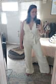 Loved the material on this romper. It felt really high quality, formal, and cozy. The length was great in that you'd need heels with it and wasn't too short like some rompers. The biggest issue is that I couldn't zip it past my booty/hips and XL is the largest size they carry. You can see the pockets are pulling in the photo cause it's just too tight. Clearly fits in the legs and up top. I'm usually an 8 or 10 so was really sad to feel limited and like there weren't any other options than returning. Also, the return itself costs $15 and I'm pretty sour since most returns are free or easy. This return required me to buy a box, tape, print a label, and get to a specific shipper. Since this order didn't come in a box, it should at least come with a return poly bag so people don't have to pay. Big bummer all around. - Megan B.