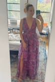 I was obsessed with this dress. I loved the colors and material, and I just felt so cool in it. Sadly, I only needed one dress, and there was another that was a little more practical and simple. I wasn't sure if the poofiness and vibrant pattern would be too much for the wedding I was attending. My friends/fam didn't love the cut on me but to each their own. Sadly, I did not keep it, but if you are on the fence, order it!! So fun!! Hopefully, this pic helps you see the color better. It does not look like the pic, but I actually like it better anyway. I also liked how tight and secure it was on my smaller chest, but if you're larger than a B cup, you may need to size up - Katie G.