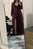 I really love it, but it did need some minor fixes. A few buttons broke instantly on the sleeves with little force, and I mean little. It's not a huge problem because it's an easy fix, but I shouldn't have to fix a dress I just bought. I did reinforce all the other buttons, just in case, because I can't have anything wrong the day of the event. It was just a little disappointing that my first experience with this brand was that, but everything was perfect for the most part. I did need to take the inner fabric in centimeters at the bust on the right because it kept folding over weirdly on the side with the outer string, but that solved the problem. I got two sizes to try on, a large and an XL. I kept the XL. It's funny that I didn't have all these problems with the large size at all. It was perfect, but it was too tiny on my chest, unfortunately. I really do love it even with those small problems. The picture also doesn't do it justice. The color is beautiful and more vibrant. - Jessica O.